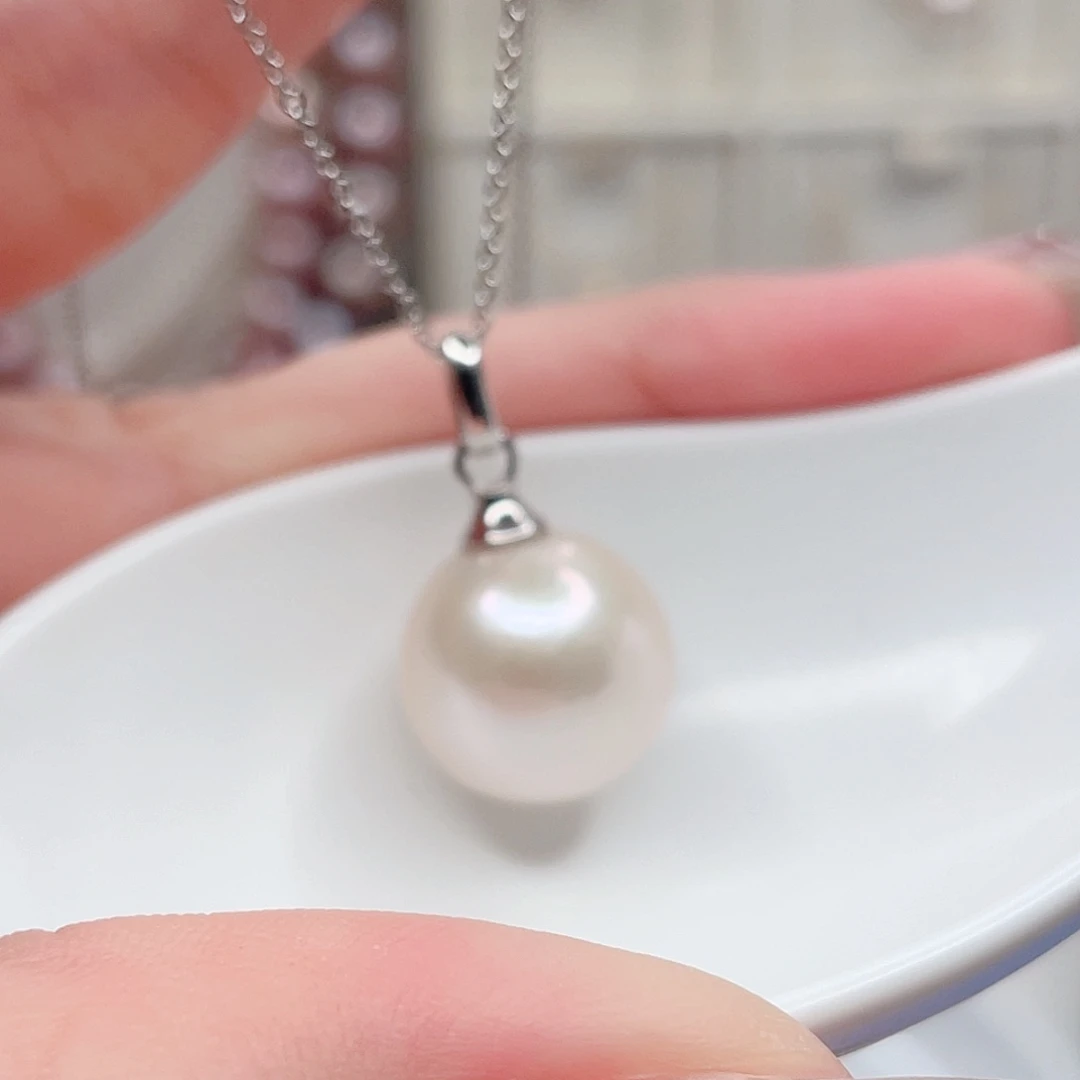 齐***猫银S925镶嵌淡水珍珠吊坠(赠链)