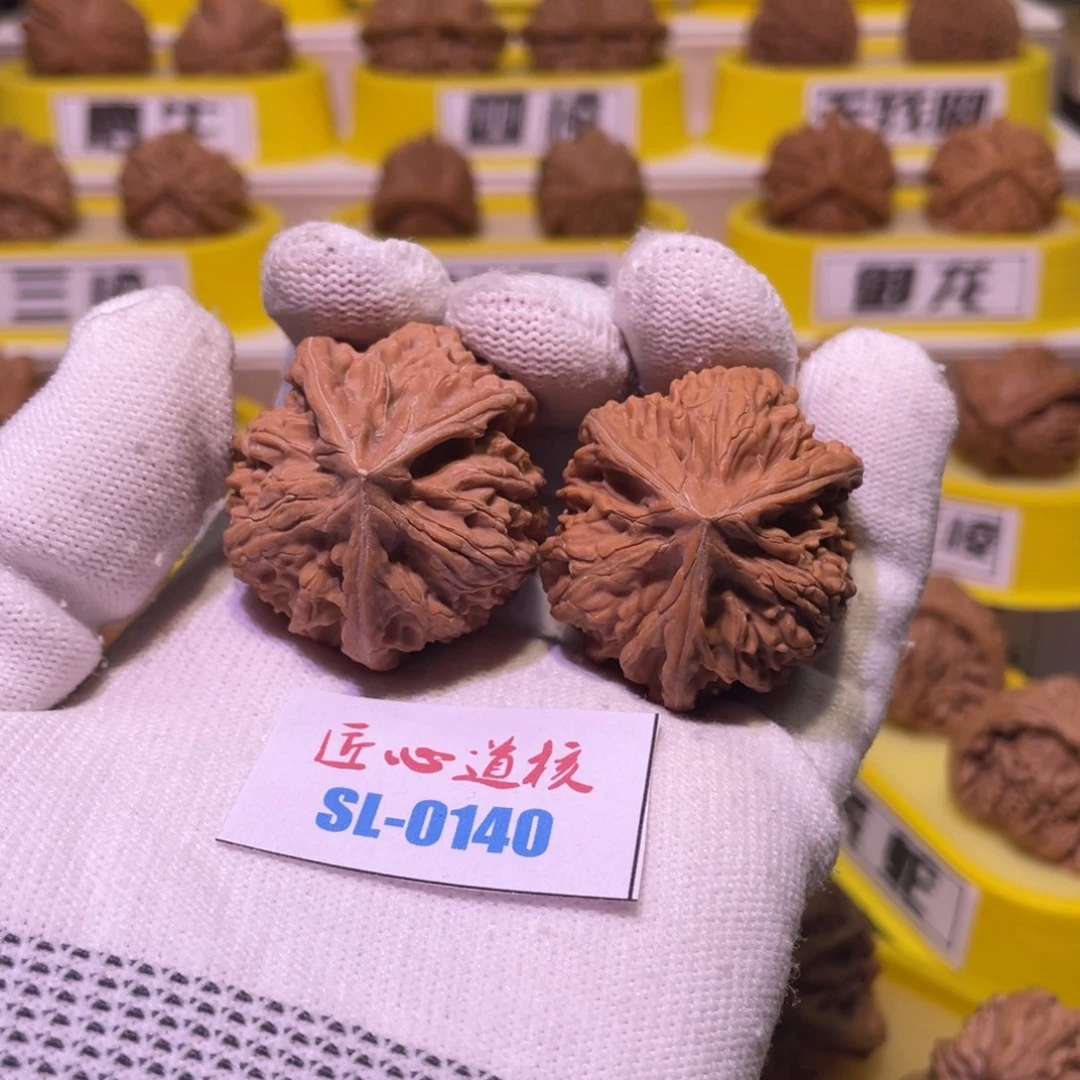 桃核把件文山三棱