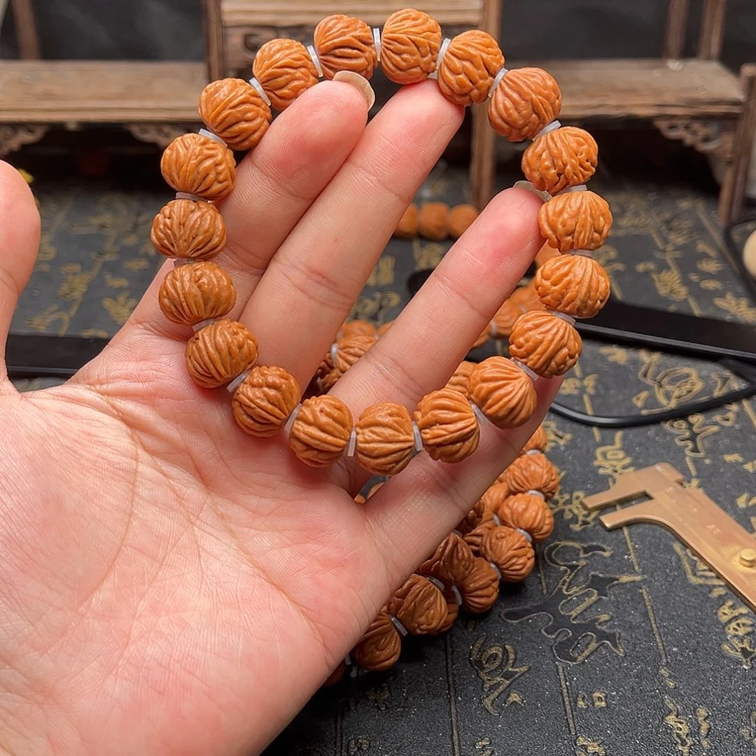 吊坠桃核小金豆手串