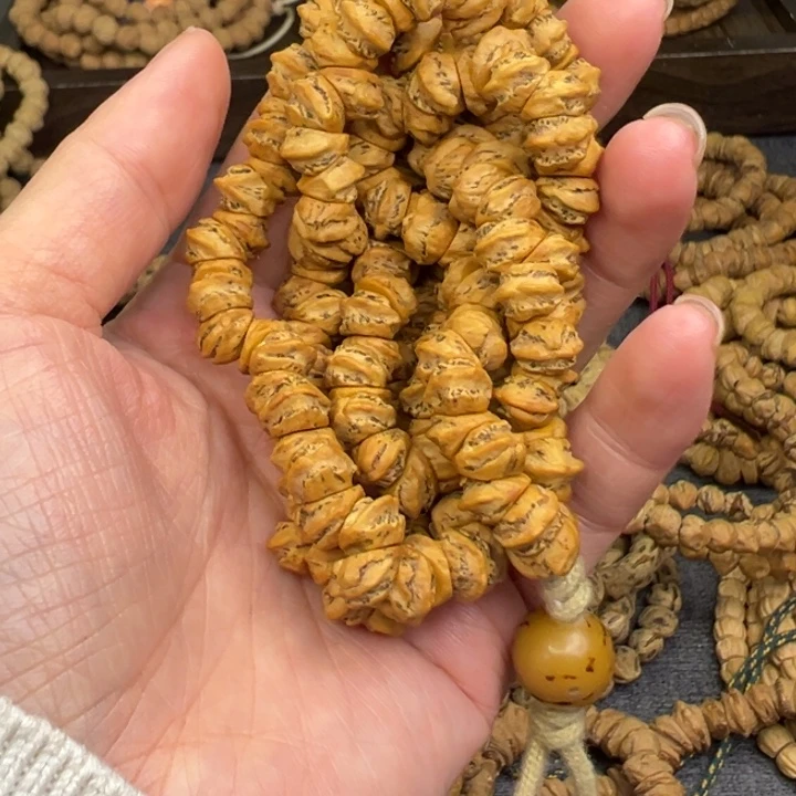 沐***店柏香籽/百香籽吊坠