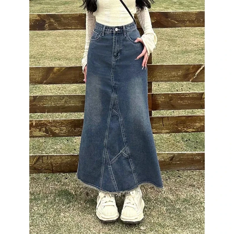 后开叉高腰显瘦牛仔半身裙女2025春季新款毛边设计感小众包臂裙女