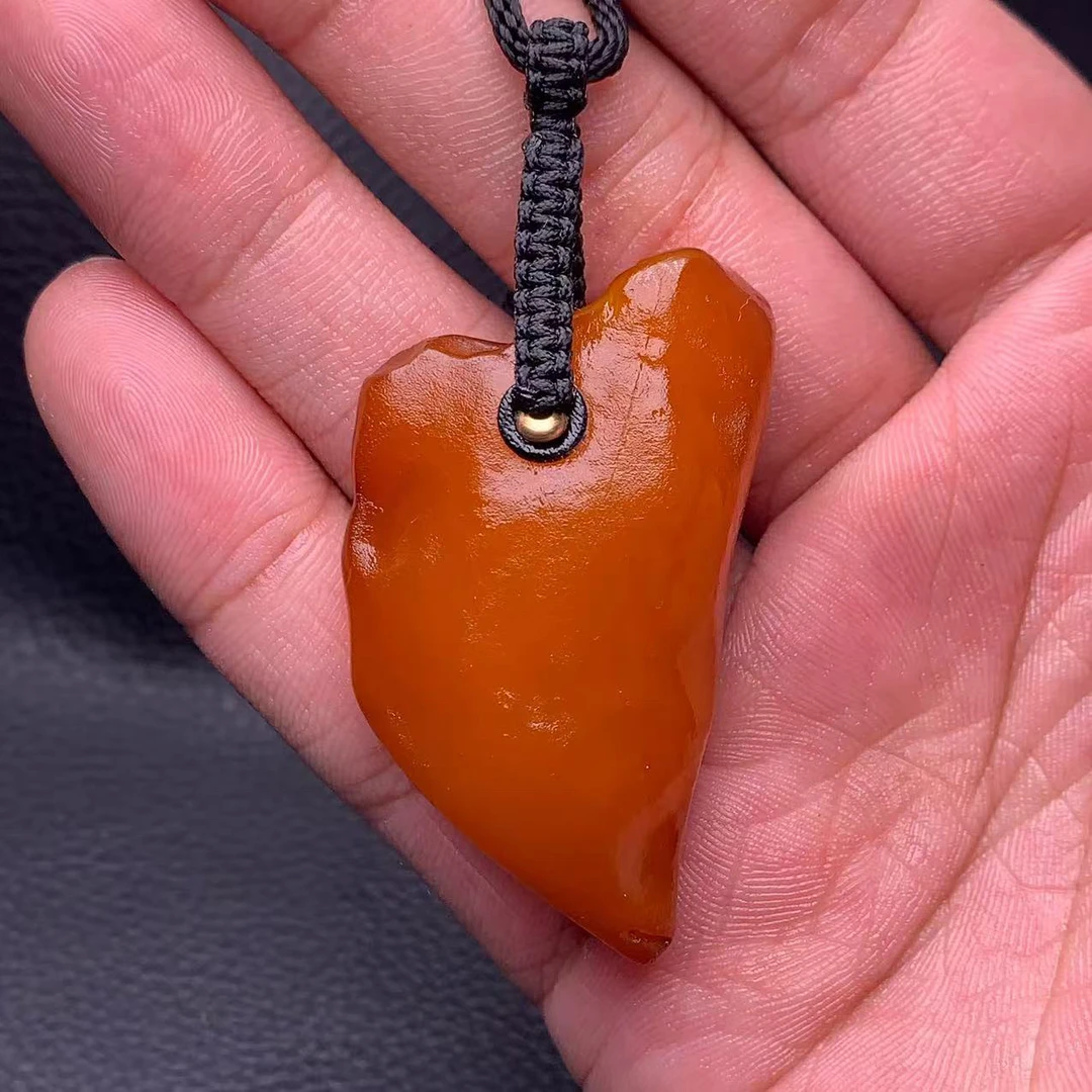 天然蜜蜡原石吊坠蜜蜡原石手把件11.2克尺寸50.2×28×12.7毫米