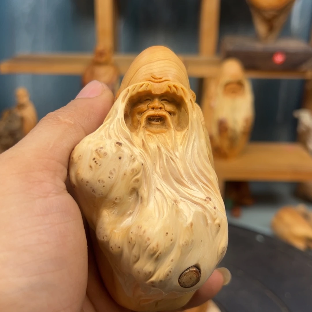 木阿****。崖柏木摆件手把件
