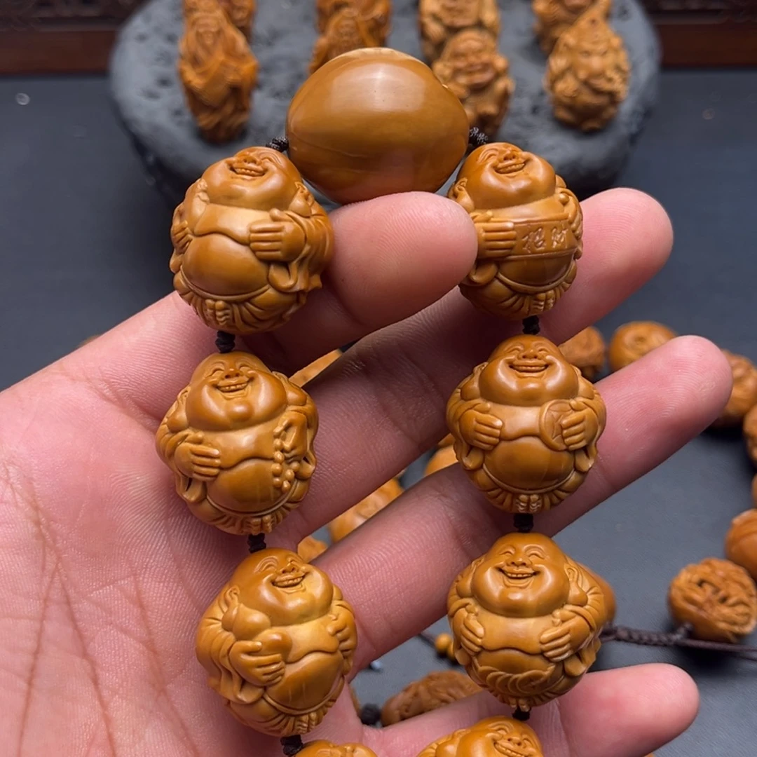 搭***车手串橄榄核大弥勒