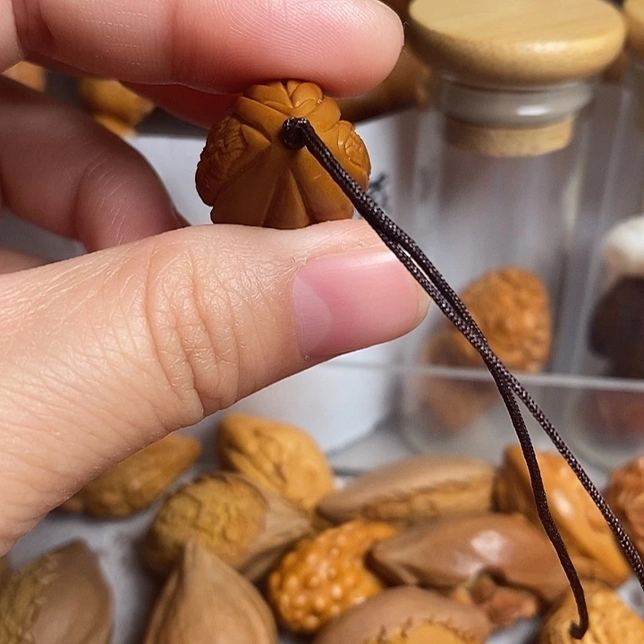 徐***斌橄榄核吊坠生命，四面