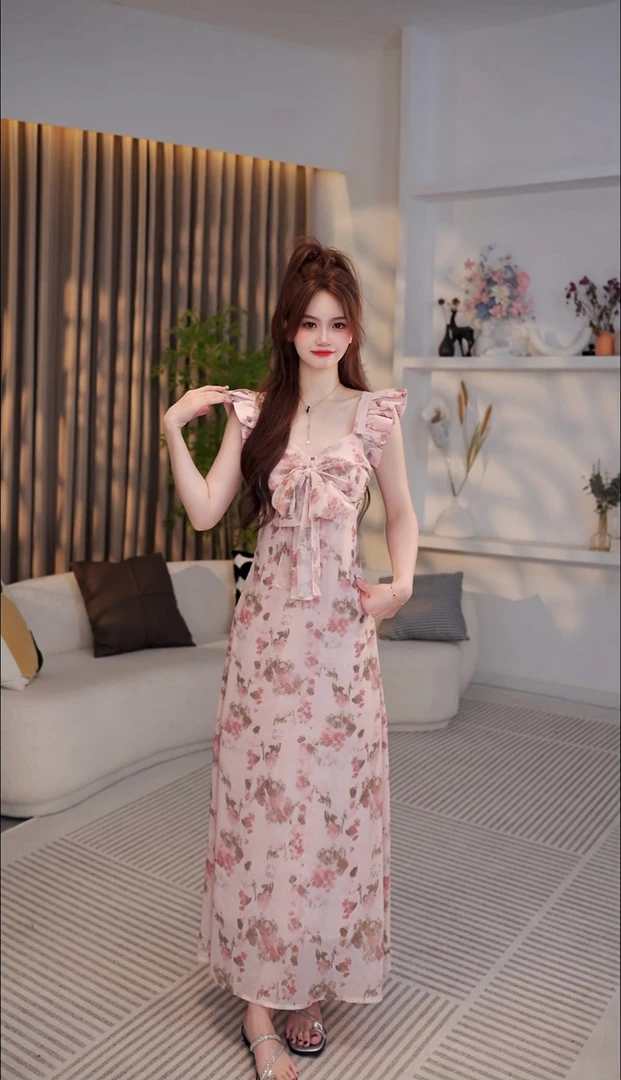 小飞袖吊带碎花连衣裙子女夏季2025新款茶歇法式海边度假气质长裙