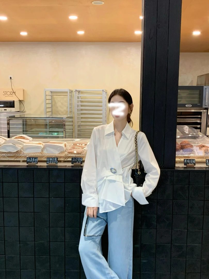 法式小资通勤长袖上衣不规则设计感小众不撞款白色翻领衬衫女早秋