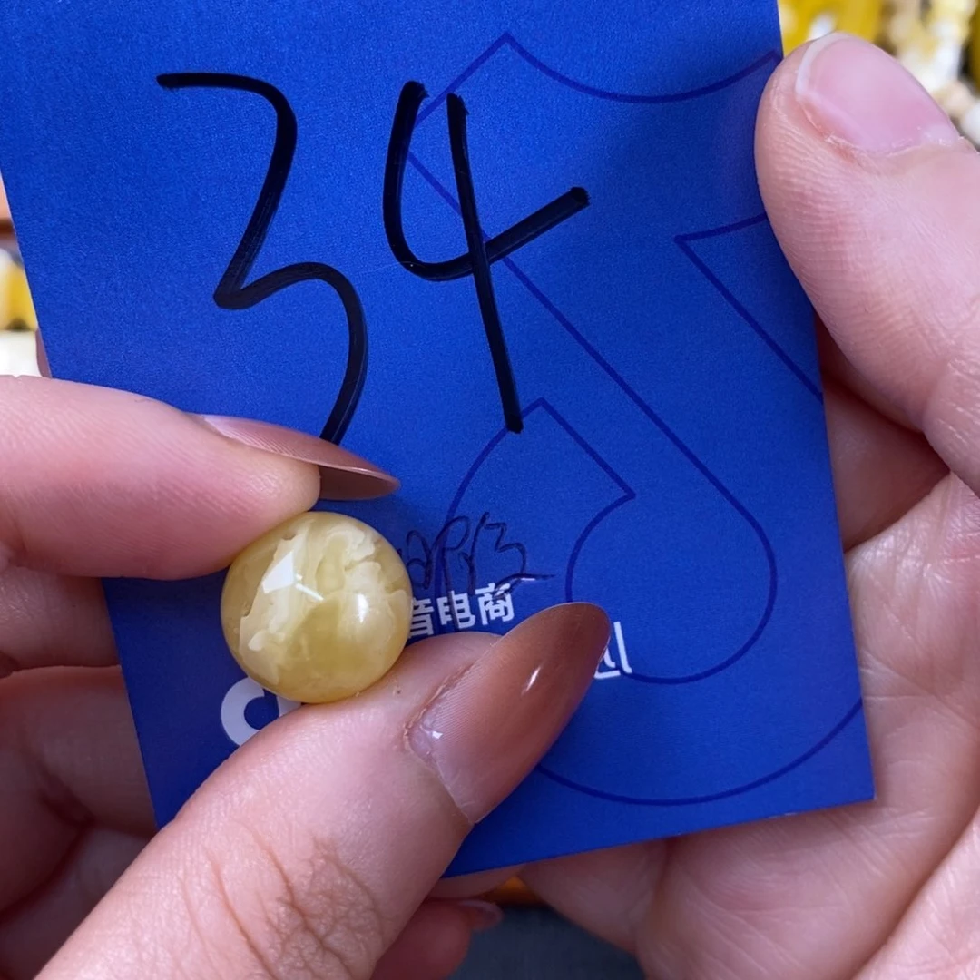 蜜蜡裸石未镶嵌李**.蜜蜡