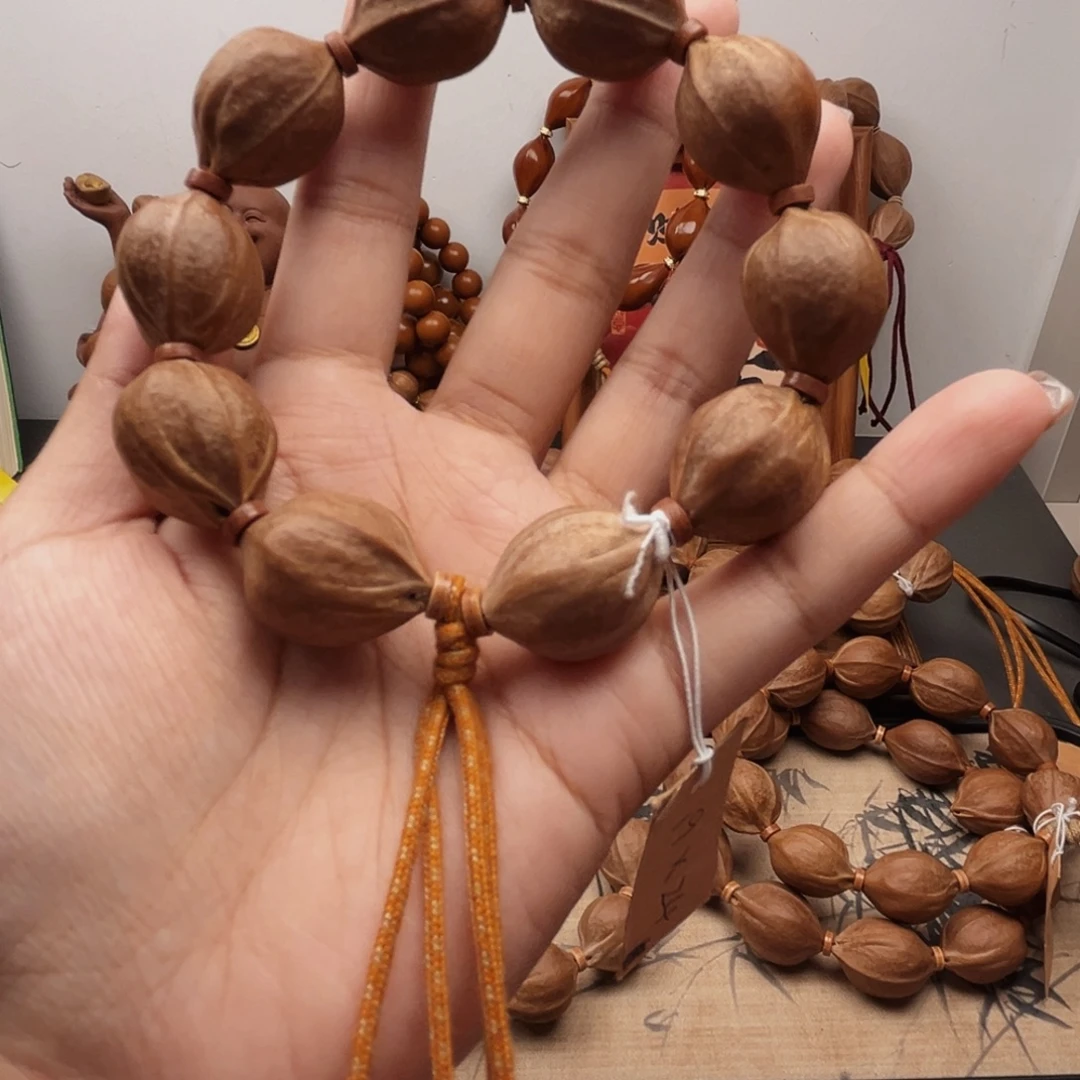 君***.手串橄榄核19.24梅林铁核