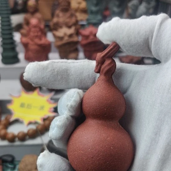 泥塑湫**人药香红麝香方葫芦瑕疵款