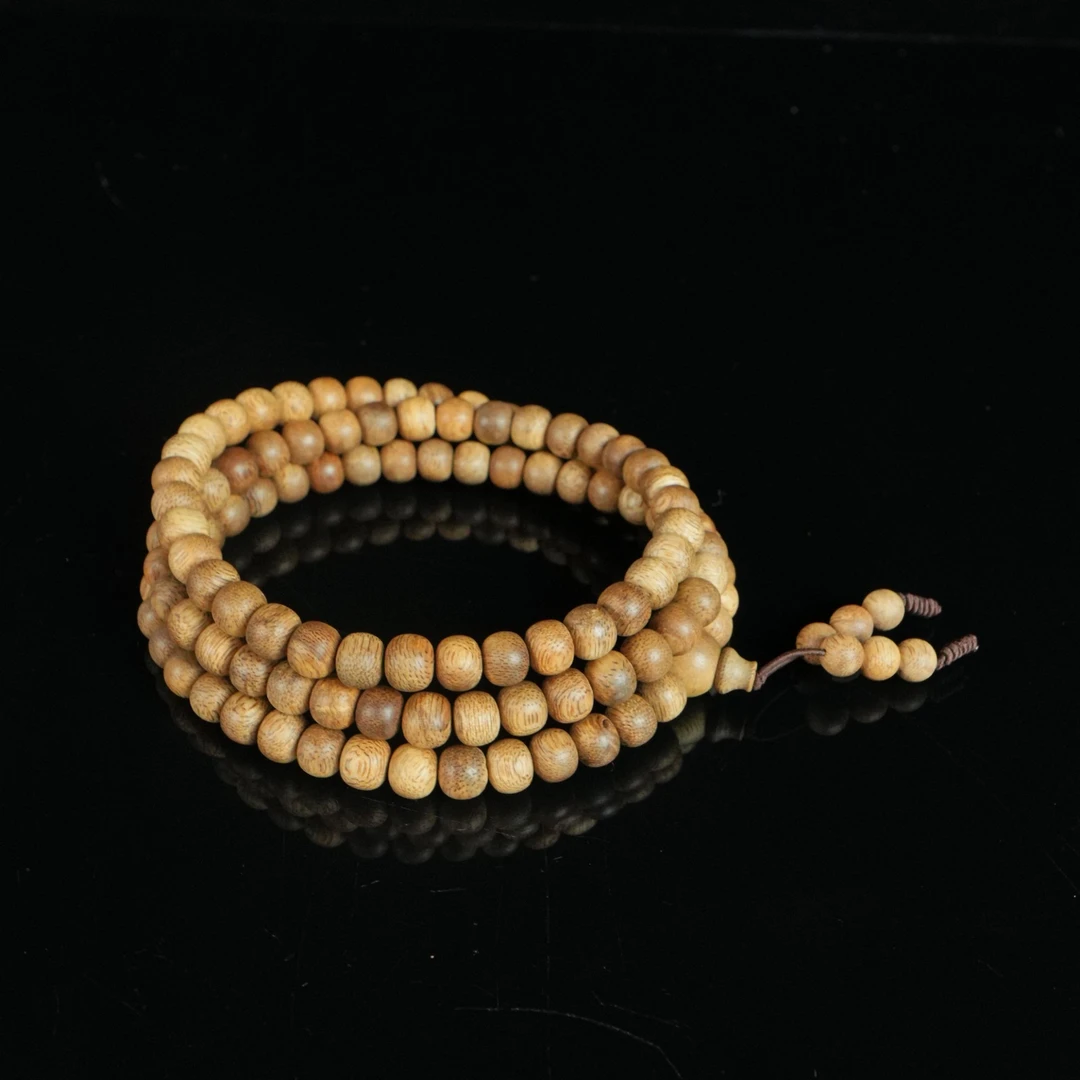 A8642 加里曼丹黄油软丝金星老料桶珠 0.81cm  19.92g