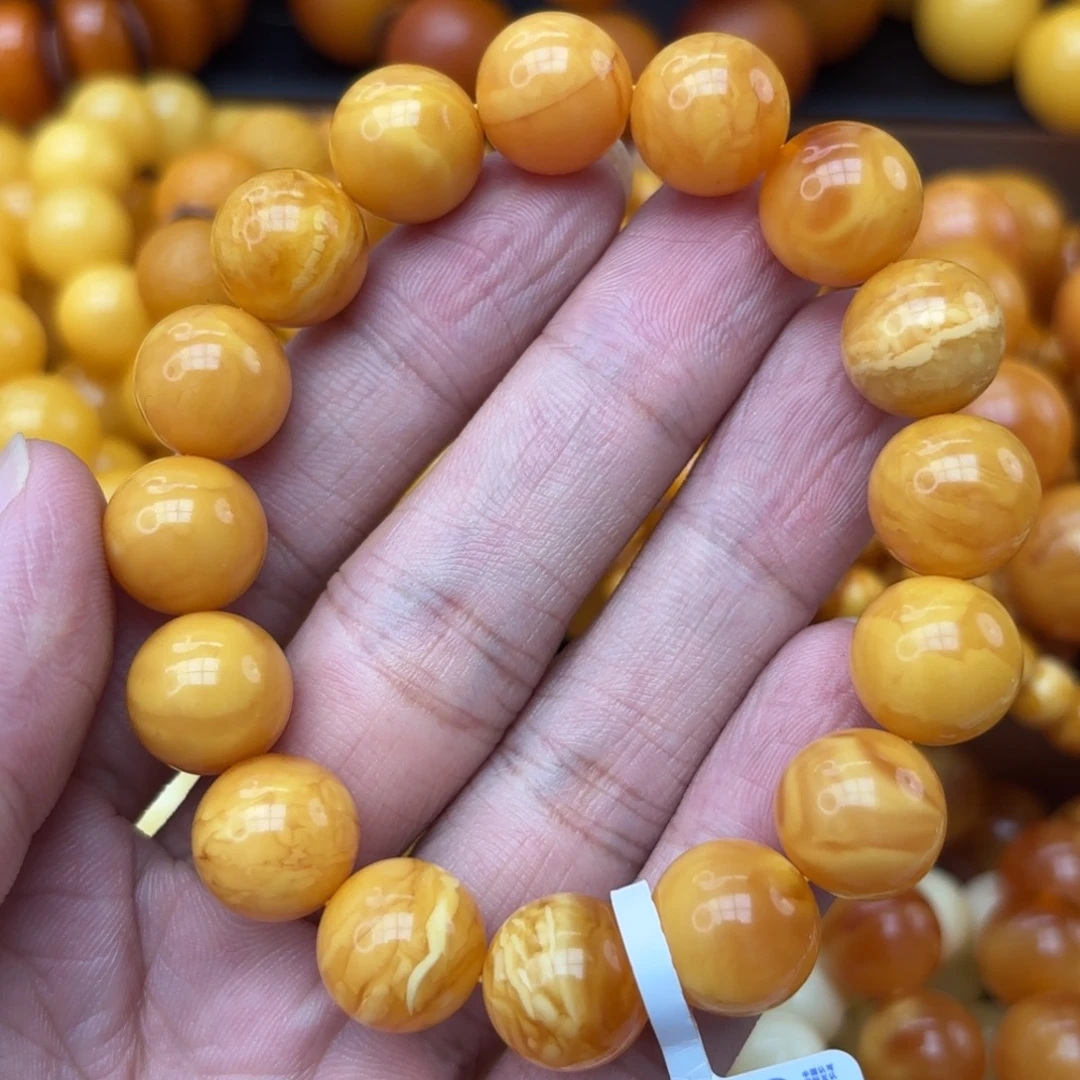 菩***下琥珀未镶嵌手链蜜蜡