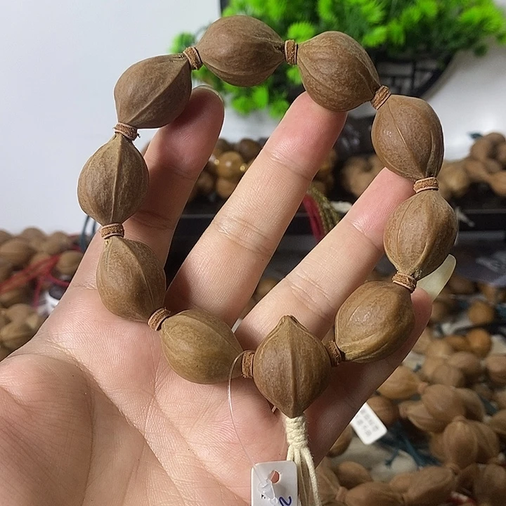 哈***笑橄榄核手串2027梅林铁核