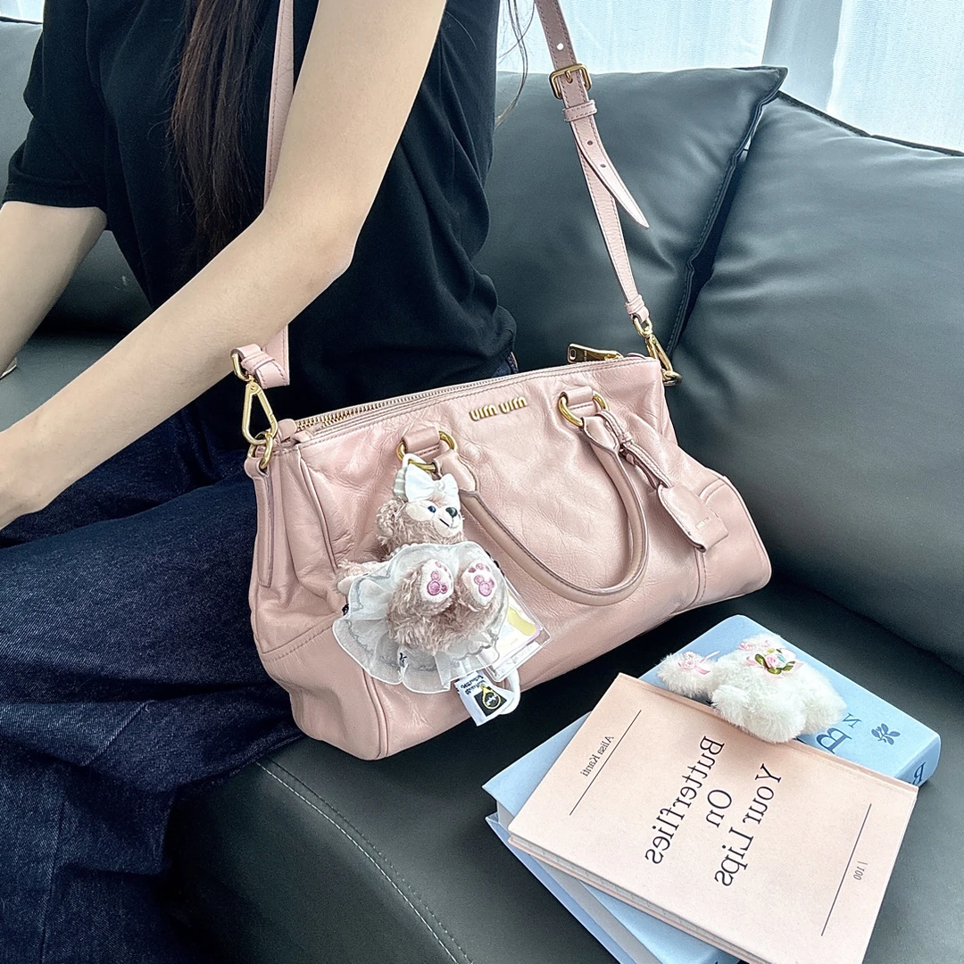 95新 MIU MIU/缪缪 藕粉油蜡皮手提斜挎包