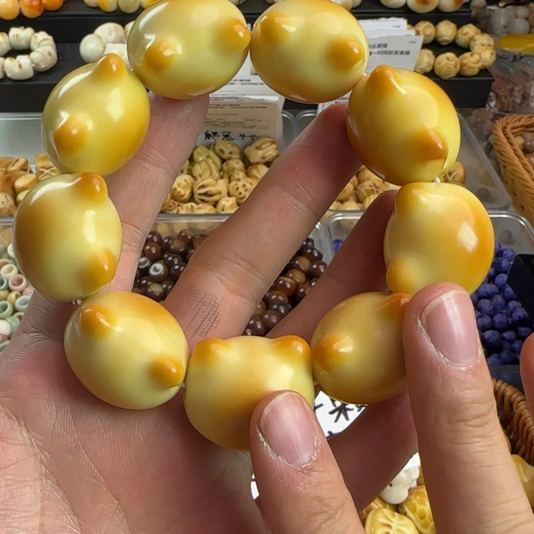 手串菩提根/象牙果微瑕炭烤猫头手串一条