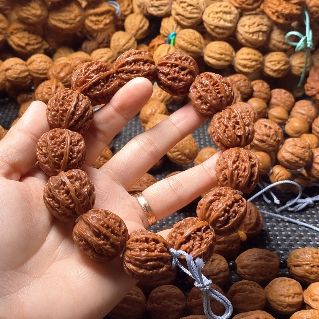 人***客文玩核桃吊坠粗筋