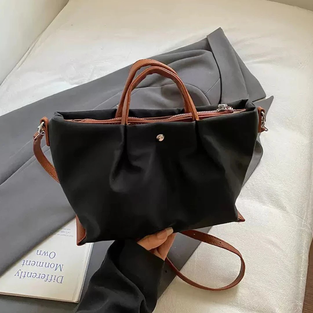 简约百搭文艺手提包包女2025夏季休闲轻便防水上班通勤单肩斜挎包