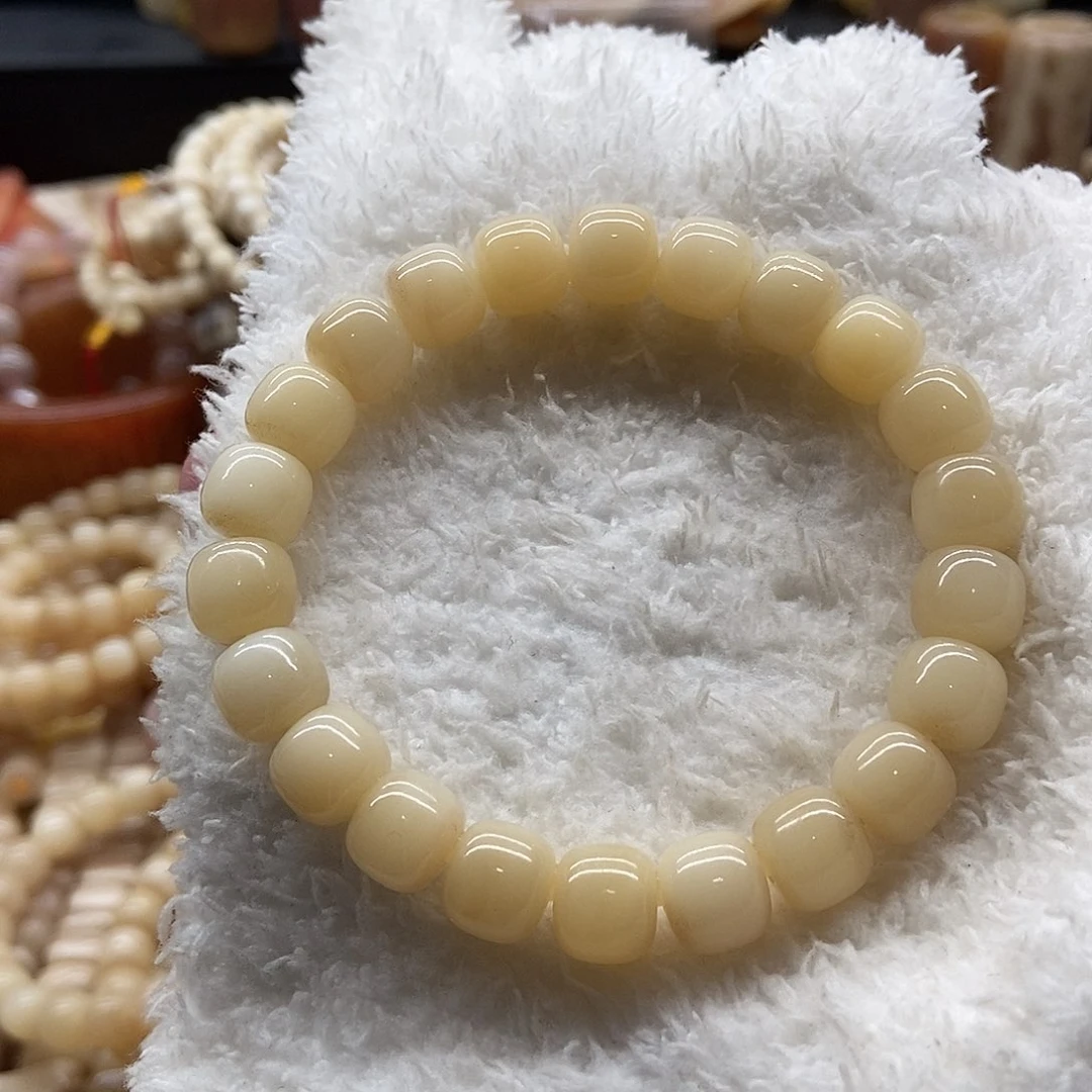 手串/手链驼骨果*10毫米蜜透料驼骨