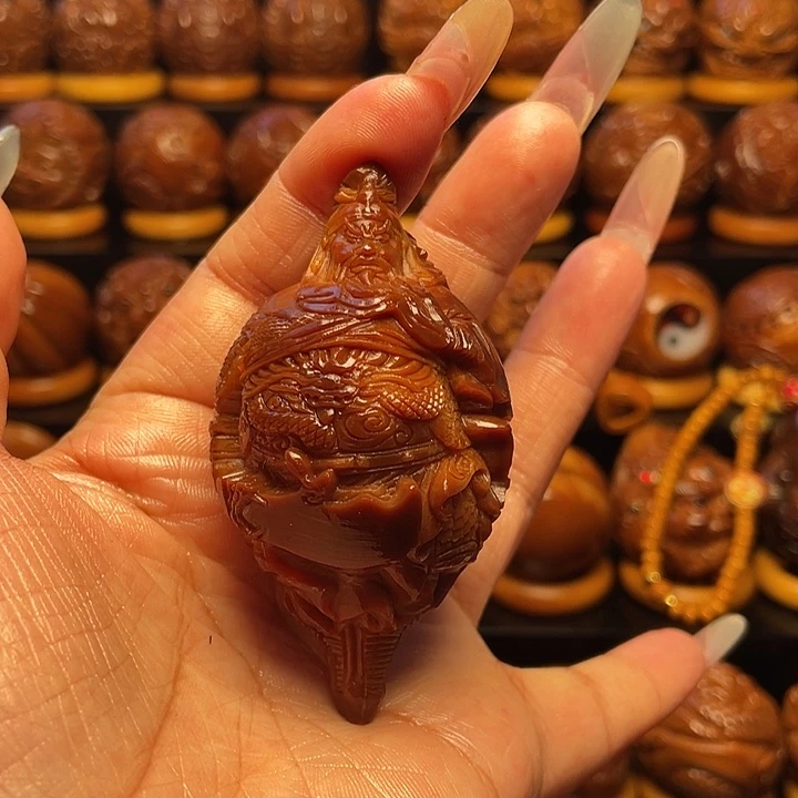 杨***桌把件橄榄核橄榄雕刻