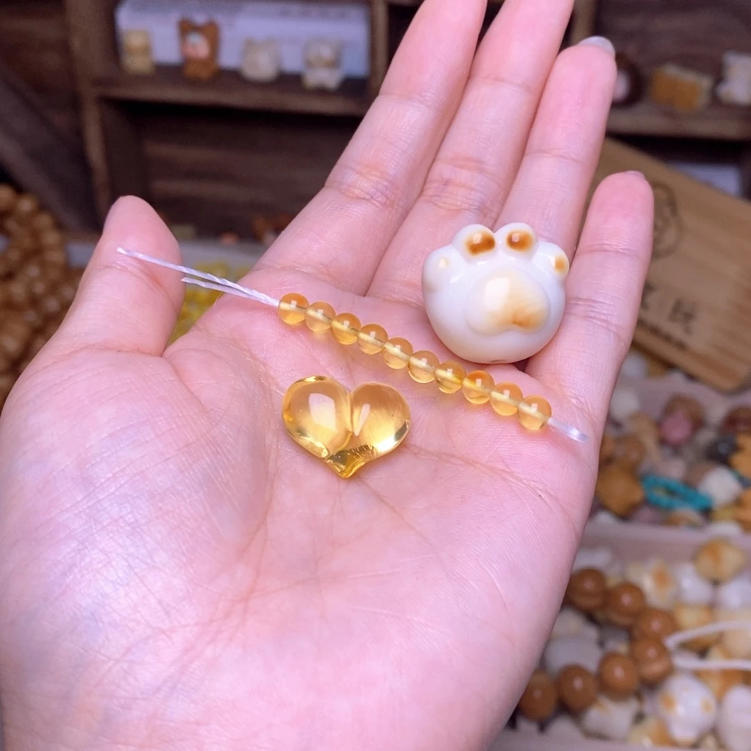 淄***衣猴头核桃吊坠1.25蜜心，蜜卡，猫爪，彩虹流苏