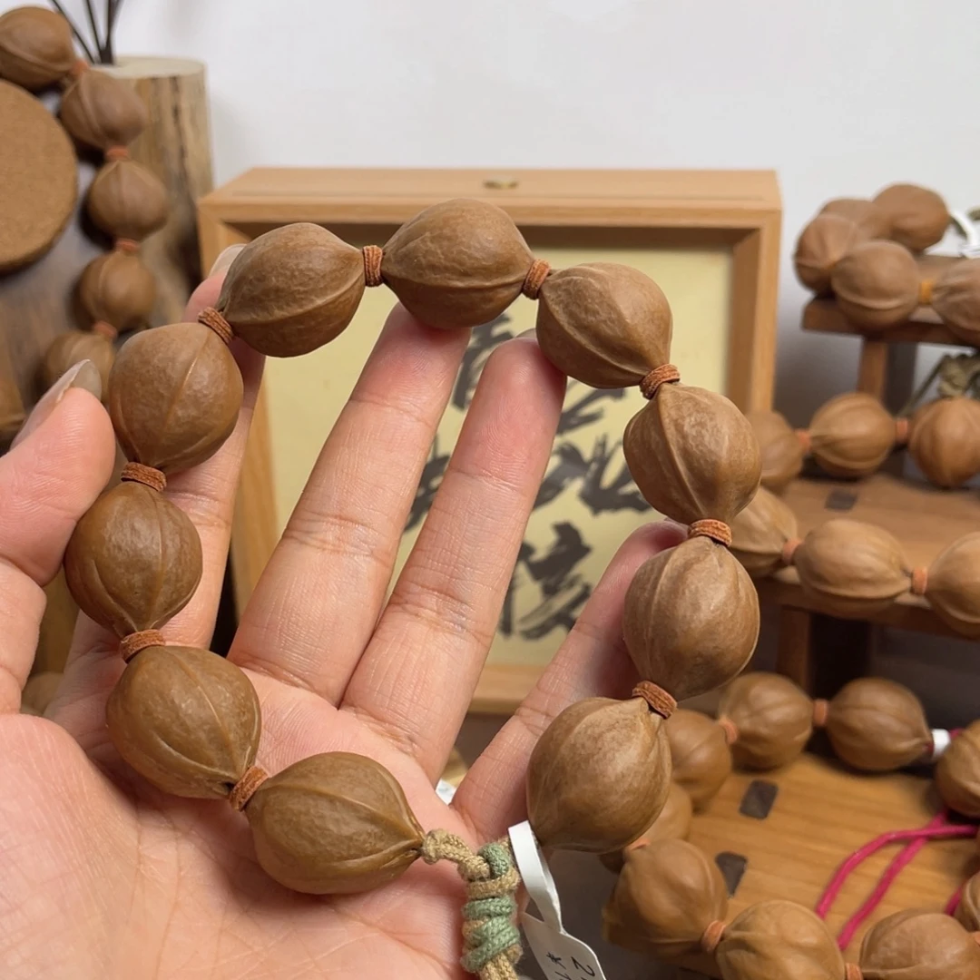 琦***儿手串/手链橄榄核21*26梅林铁核