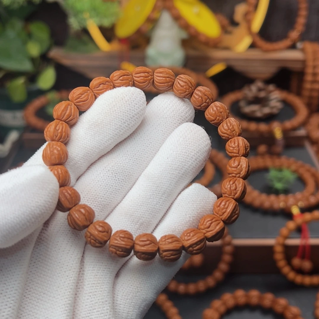 吊坠桃核@****呢1.0双脊龙手串