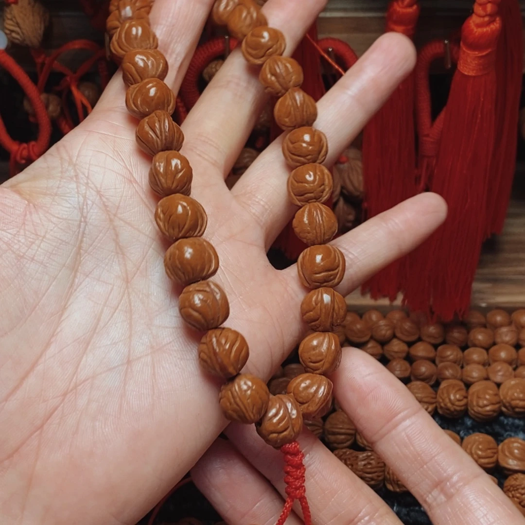 桃核吊坠桃枭手持1