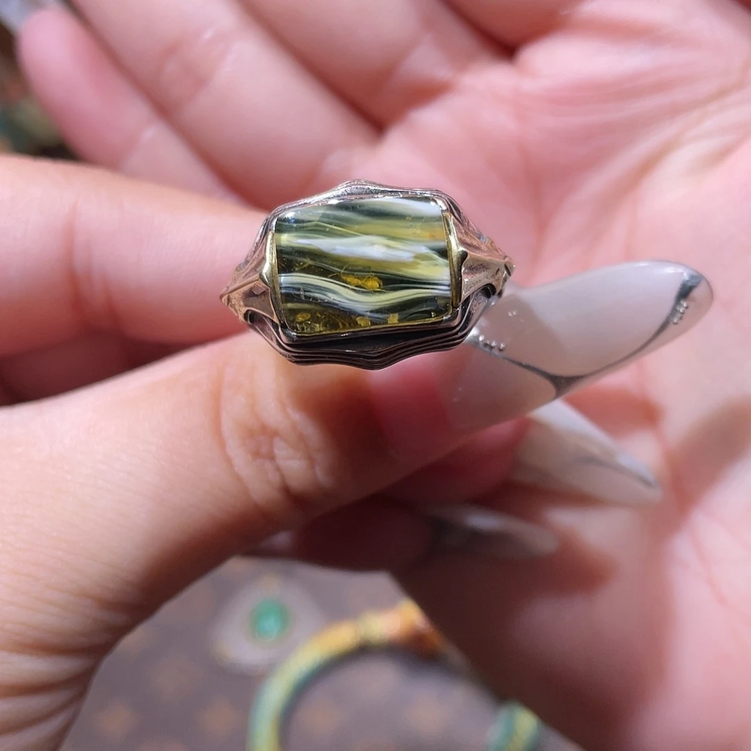 蕊***蕊琥珀银S925镶嵌戒指戒指