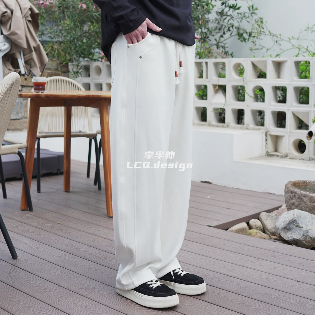 夏季男士新款宽松针织休闲裤百搭立体铆钉卫裤男弯刀水洗卫裤