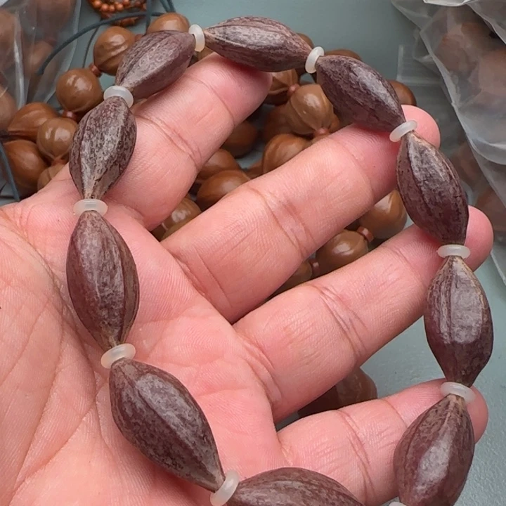 晴***空手串橄榄核橄榄核原皮紫皮