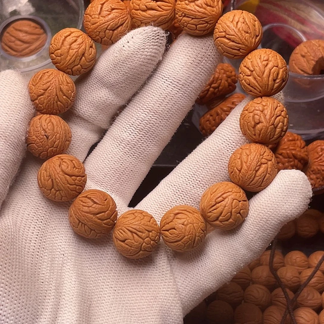 桃核手串金丝龙珠1.5