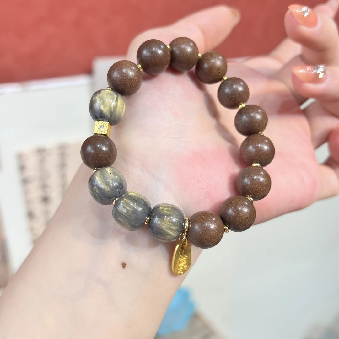 12合香珠息肌黑金单圈手串