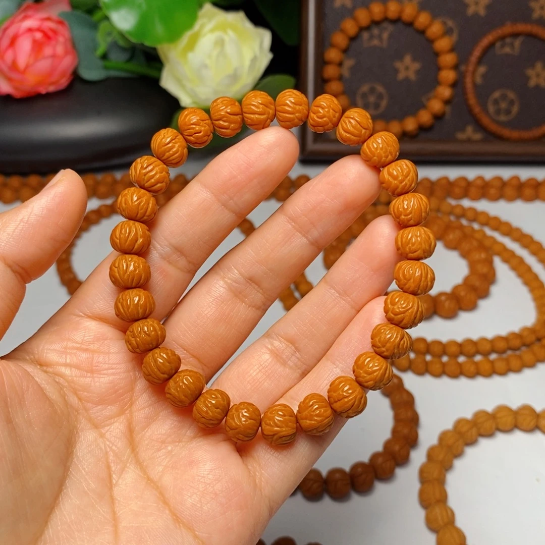 小***卢桃核手串10mm野生凤羽聚宝盆手串毕业款