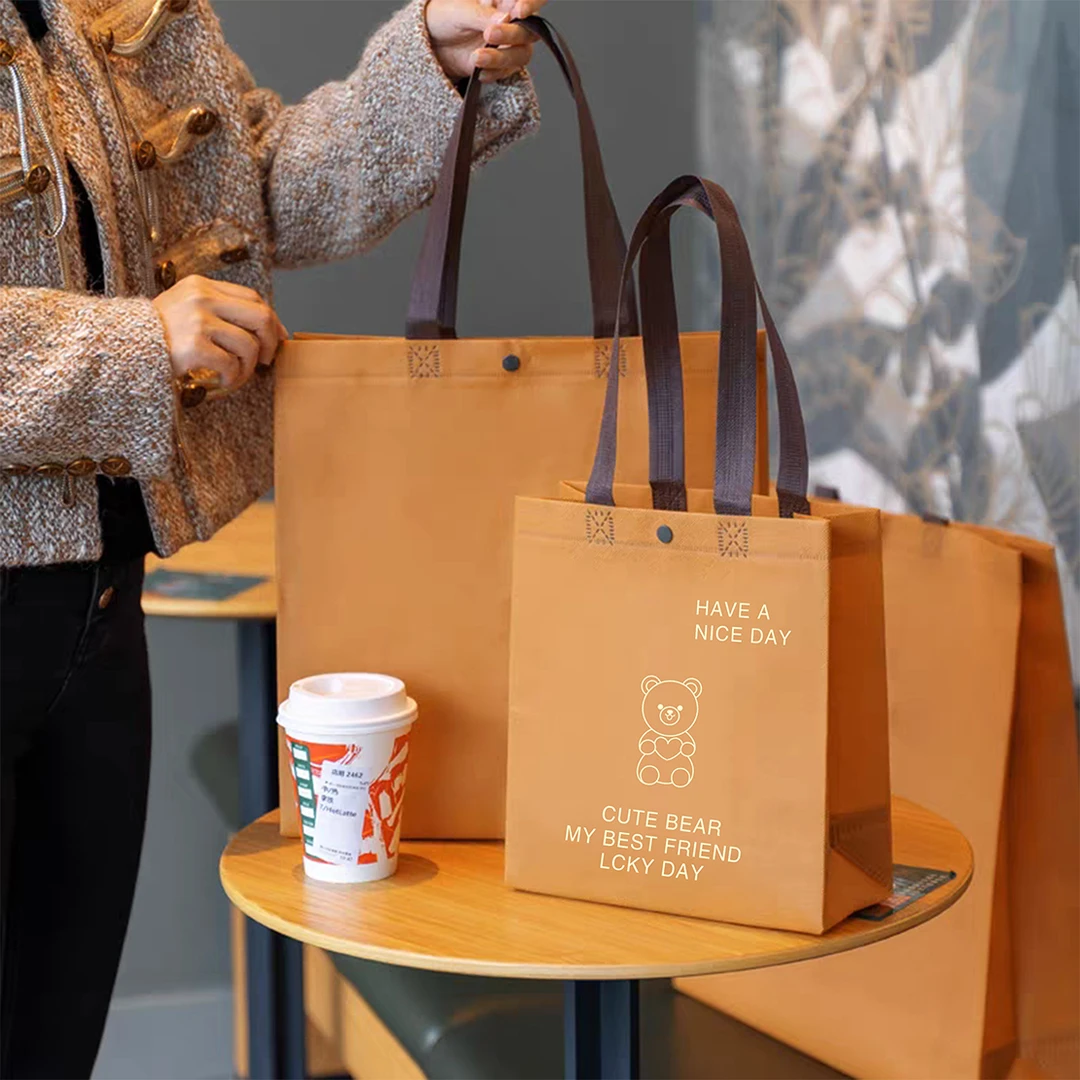 无纺布手提袋暗扣服装店袋子衣服包装袋定制logo礼品袋印刷环保袋