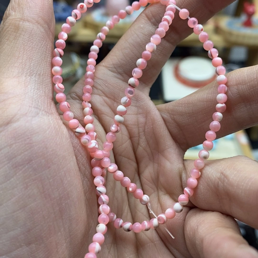 玛瑙/玉髓未镶嵌珠宝半成品一条3mm优化粉马蹄螺贝壳C134