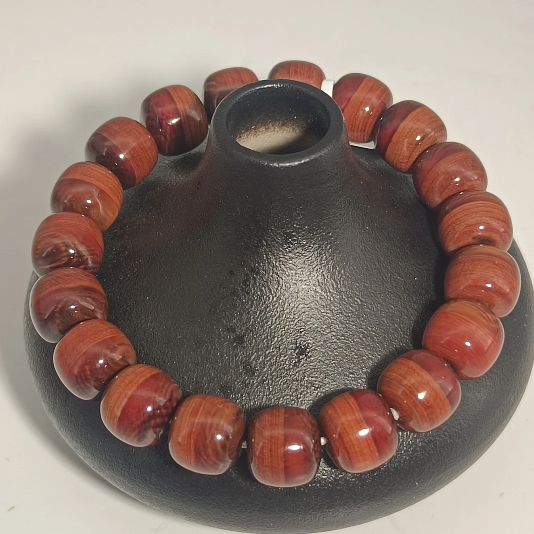 猛犸牙雕猪肝红单圈手串10*10mm假一罚四X2116