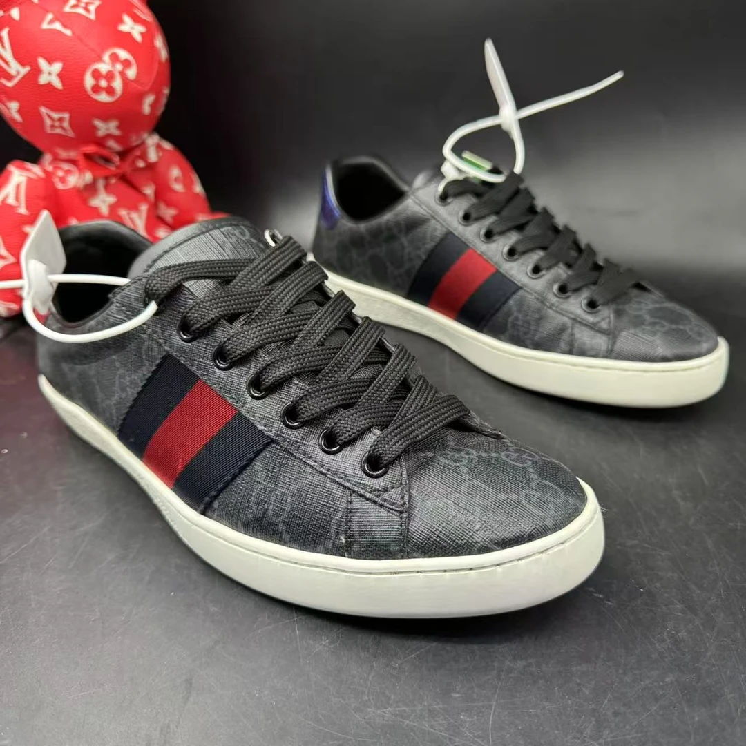 95新 GUCCI/古驰 【AO福利】42欧码 男士黑色暗纹老花休闲板鞋