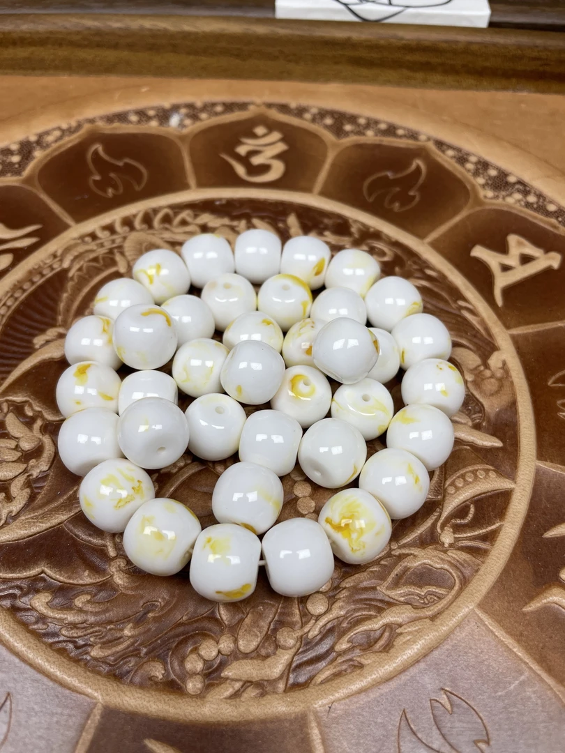 10*12MM天然漆白老型散珠一颗【拍19颗穿好发】