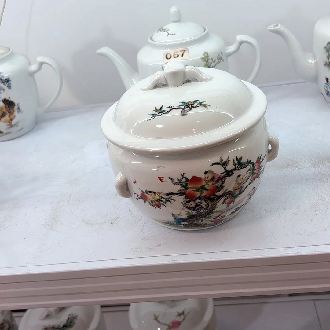 壶陶瓷九子蟠桃三斤储物罐