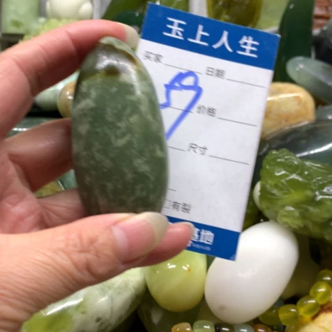 晴***里蛇纹石玉未镶嵌手把件