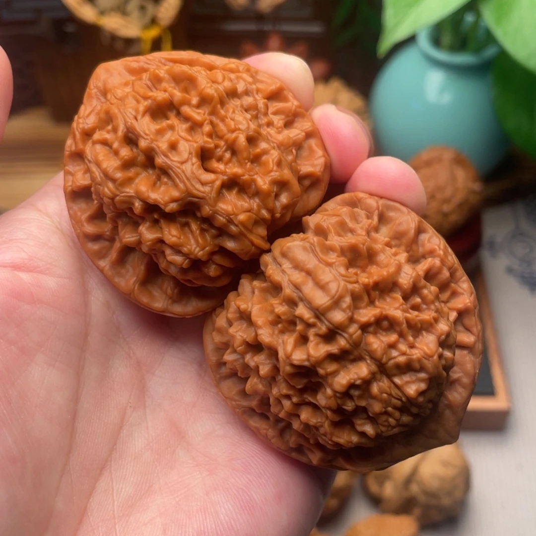 桃核把件全品红皮麒麟纹46+