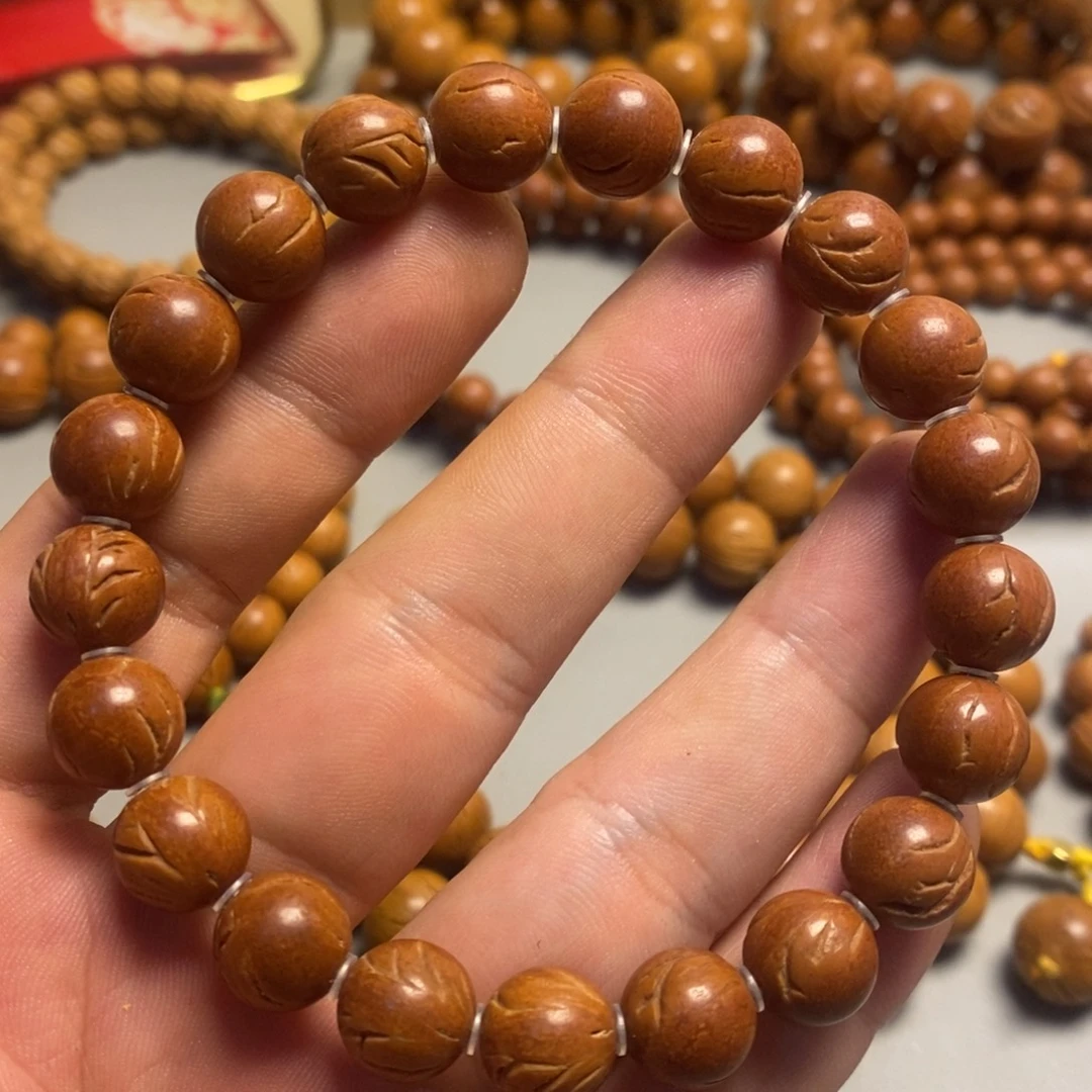 手串桃核龙纹光珠11