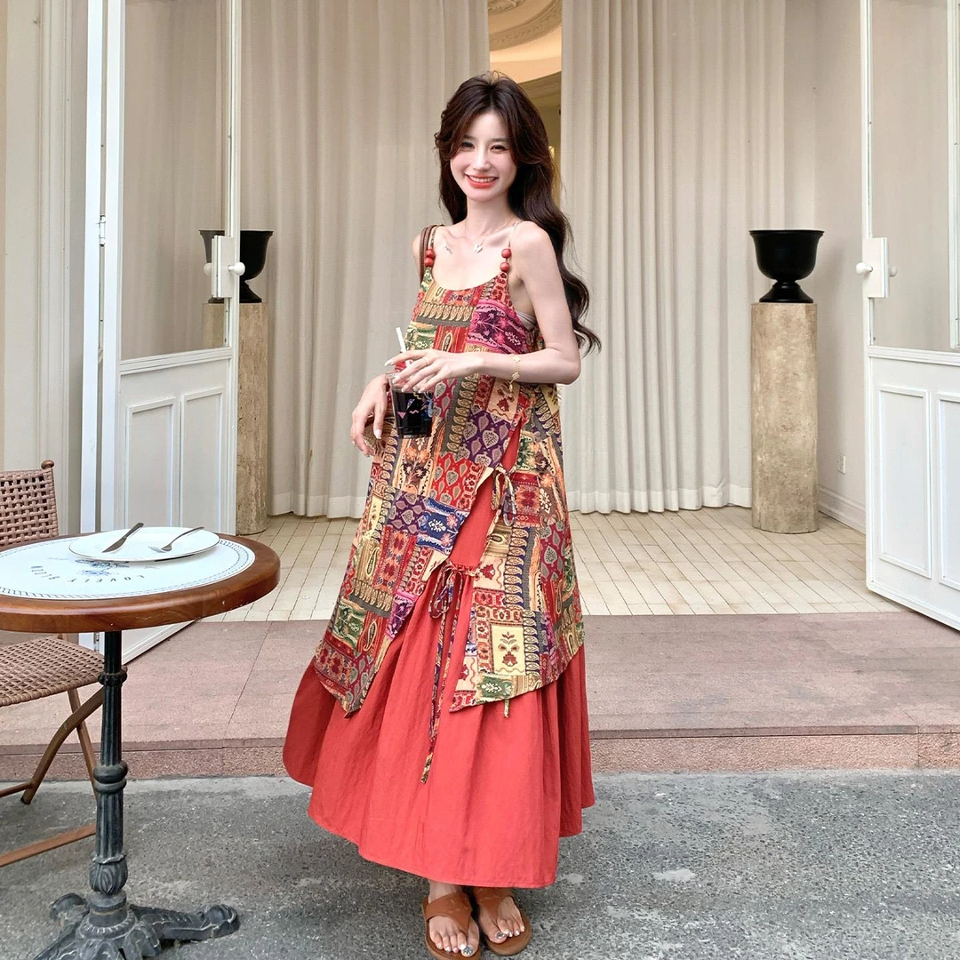 红色假两件拼接碎花吊带连衣裙女夏2025新款法式绝美海边度假长裙
