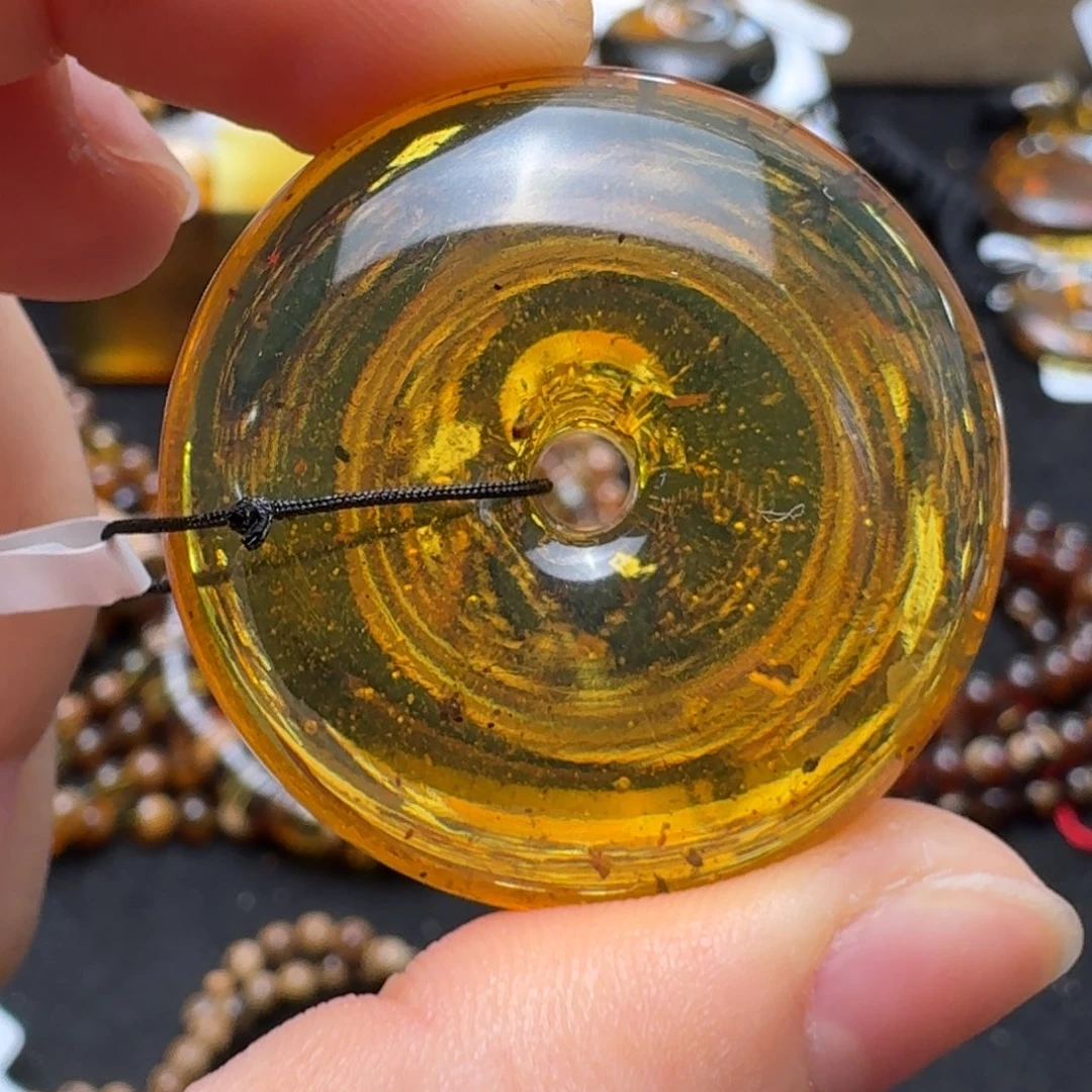 未镶嵌琥珀珠宝奇石黄茶变色平安扣（带花粉