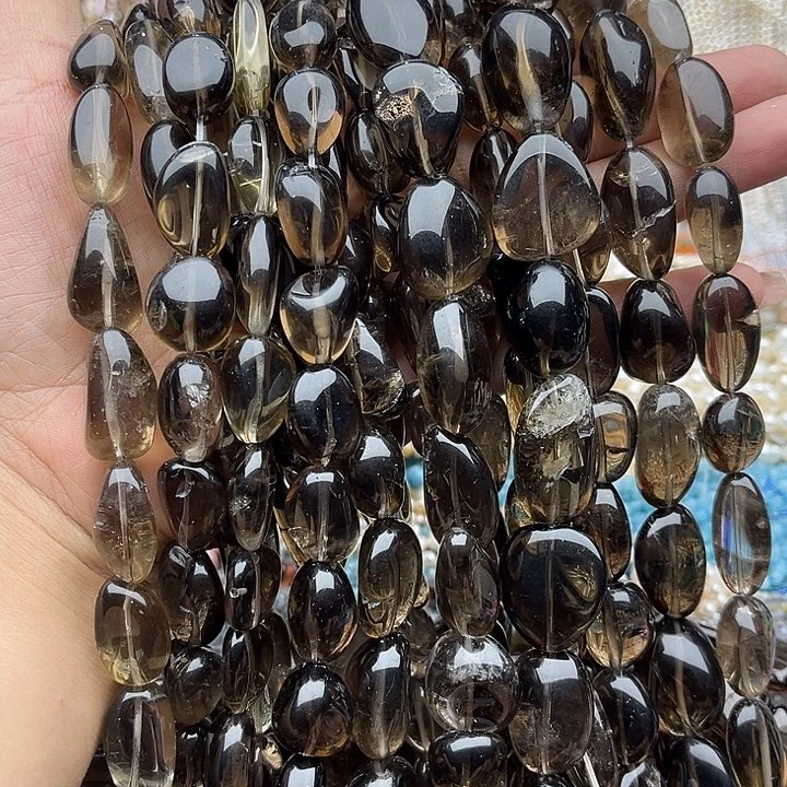 玛瑙/玉髓未镶嵌珠宝半成品一条茶晶随型几颗有瑕