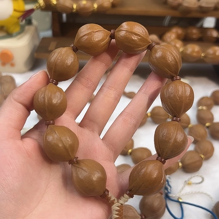 曲***哥橄榄核吊坠梅林铁核2026