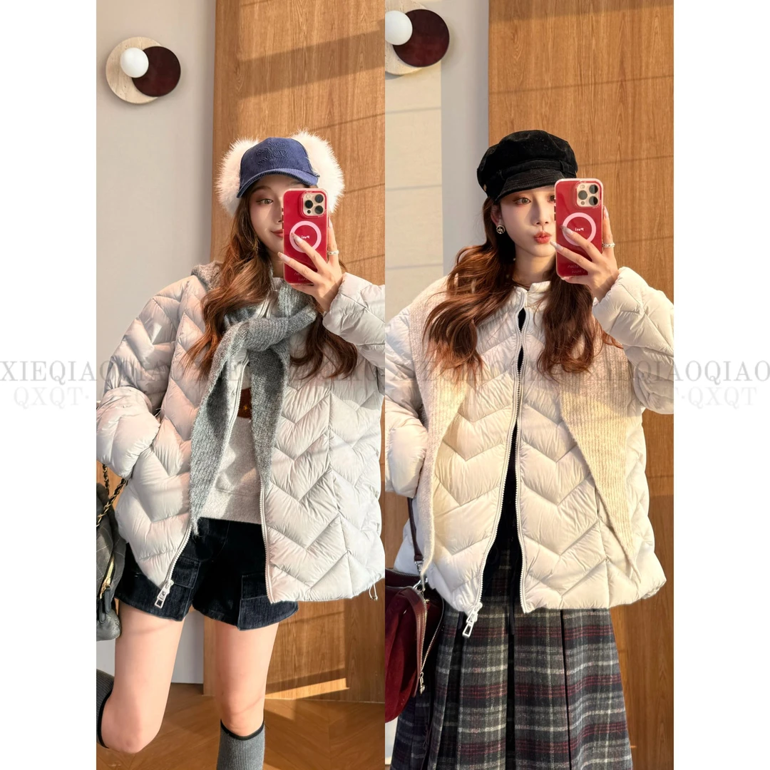 谢荞荞「暖暖壁炉」90白鸭绒配有针织围巾排骨厚款保暖宽松羽绒外套
