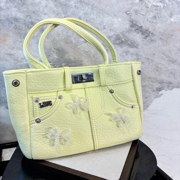 蝴蝶结黄色包包BB147