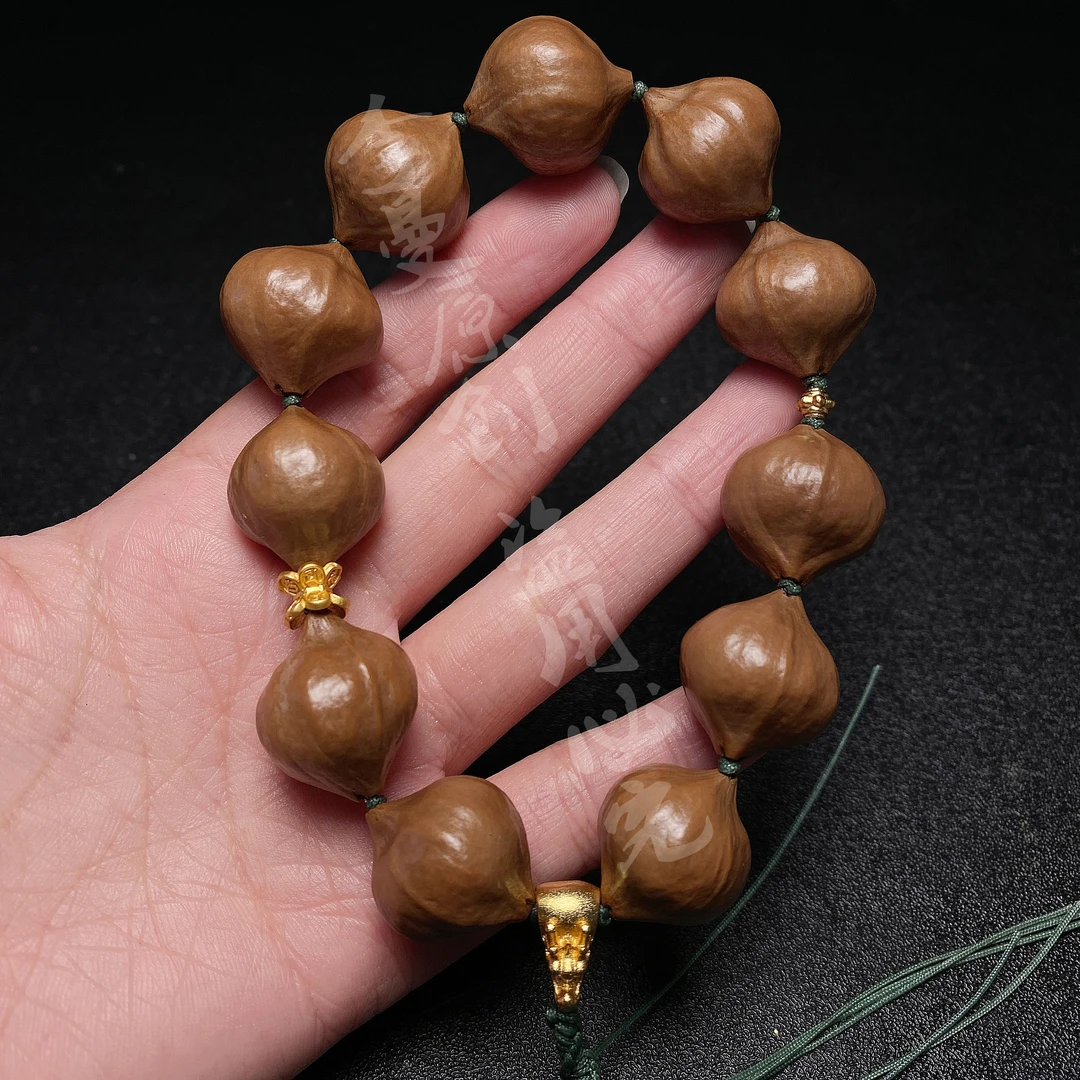 1.9素核手串橄榄核原核文玩工艺品