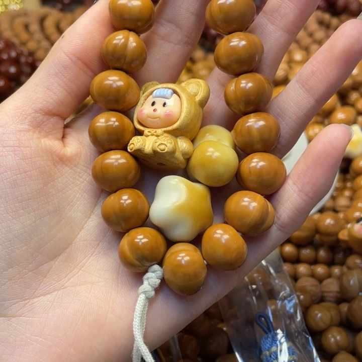 沁***辰手串猴头核桃二等屁桃加娃和心和星